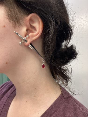 Customer photo review of Blood Sworn Dagger Stud Earrings
