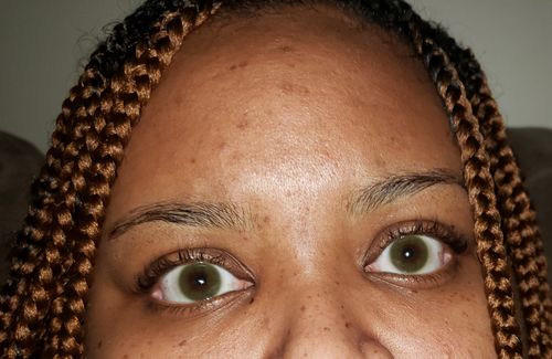 Customer photo review of Polar Lights Yellow Green Prescription Contact Lenses