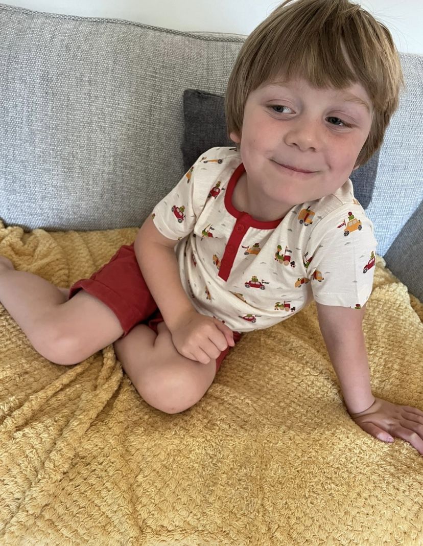 Customer photo review of Off On A Journey Short Sleeve Henley Top