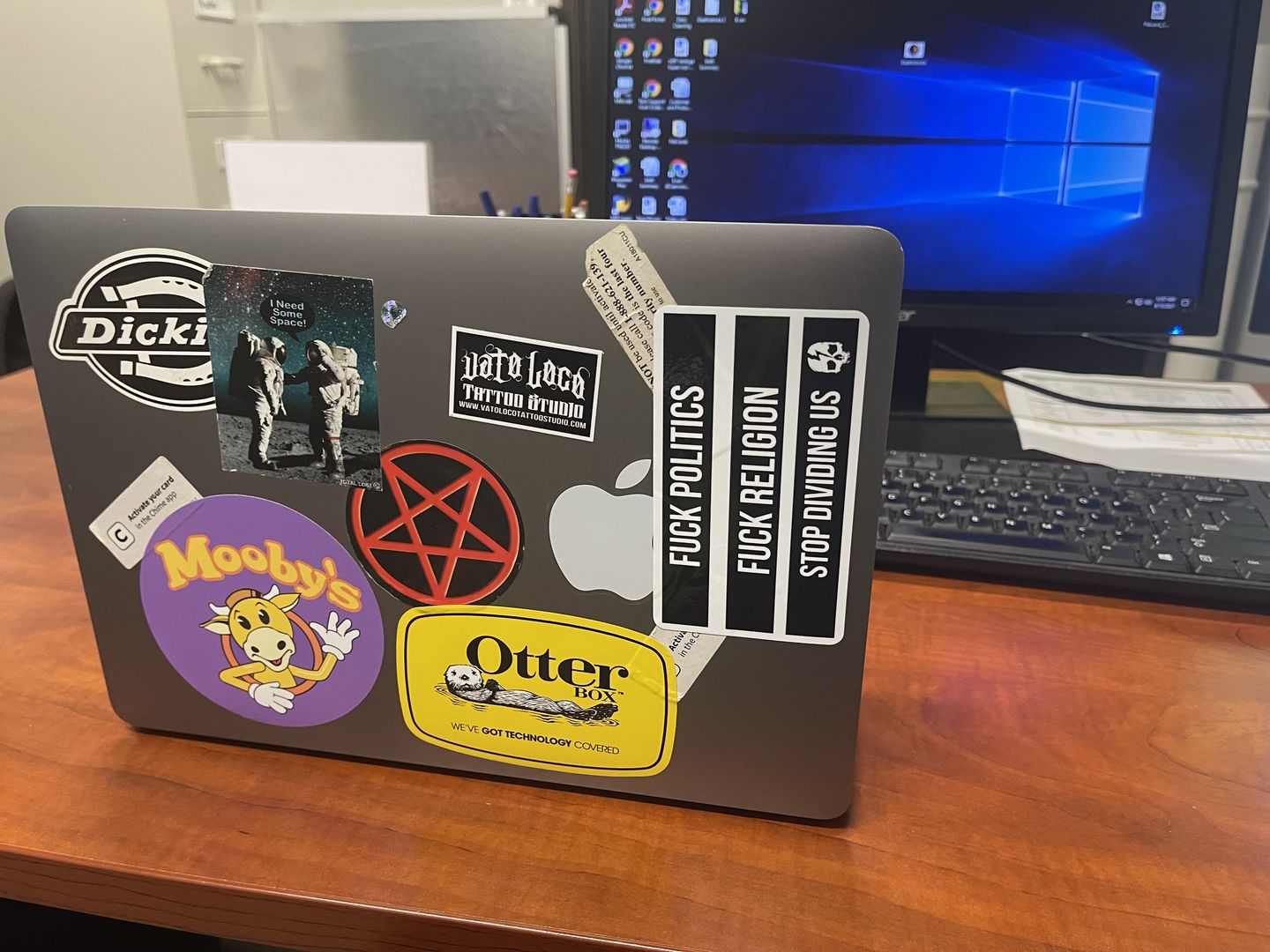 Customer photo review of STOP DIVIDING US STICKER