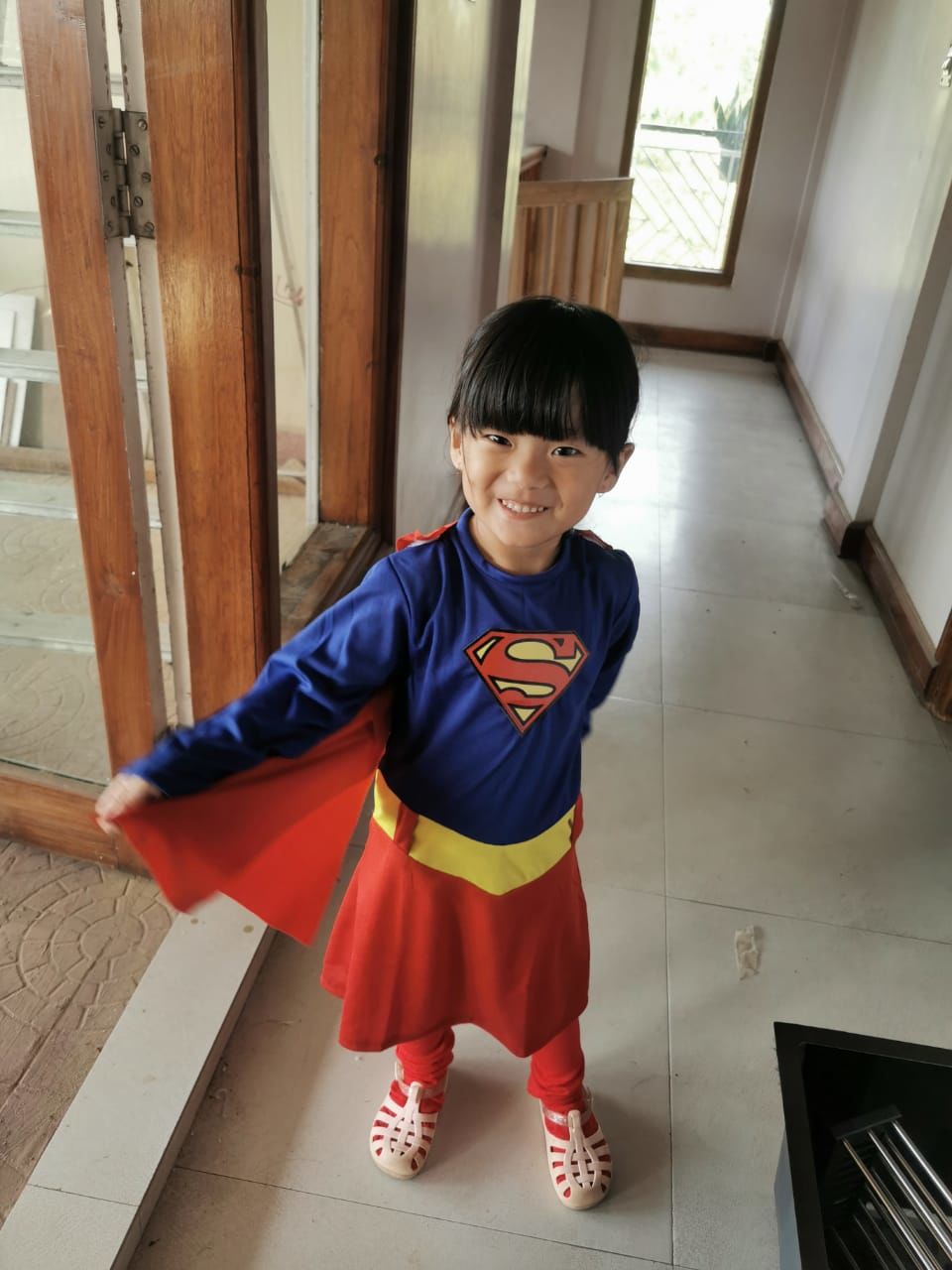 Customer photo review of Supergirl Dress with Cape and Stocking
