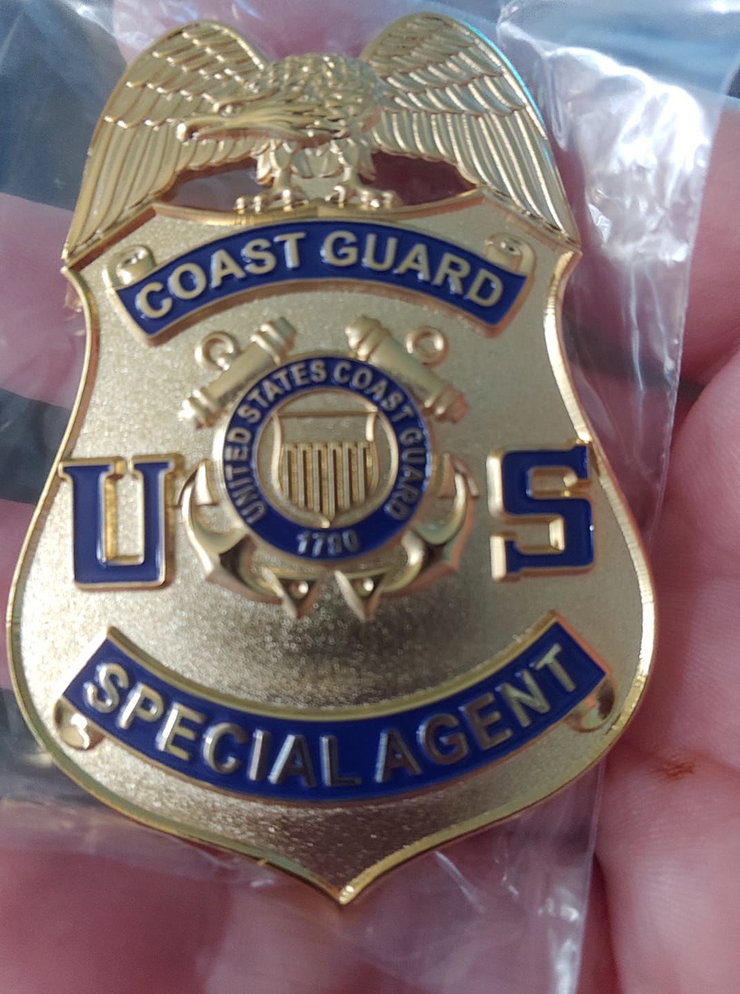 Customer photo review of US Coast Guard Special Agent Badge Solid Copper Replica Movie Props
