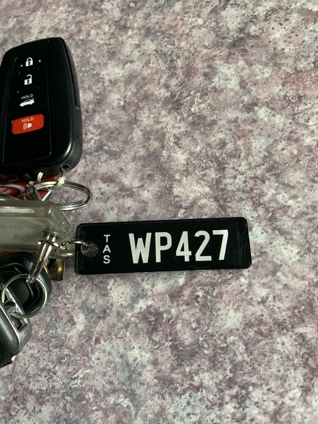 Customer photo review of TAS Prestige Licence Plate Custom Keychain