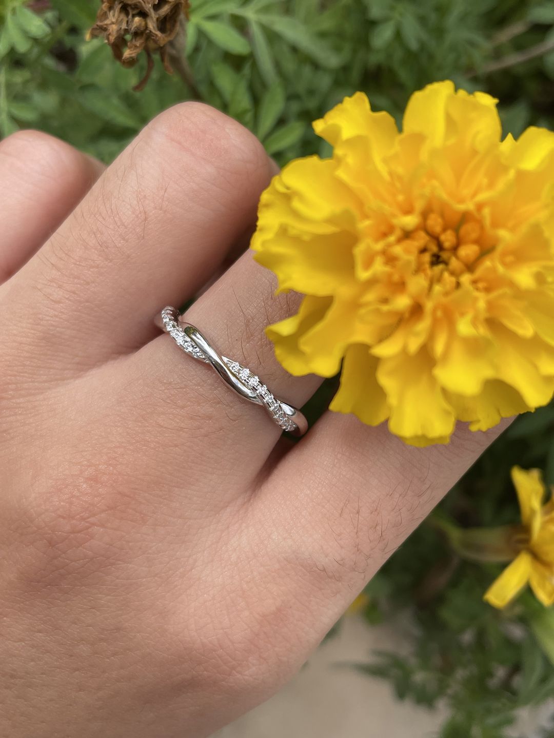 Customer photo review of Louily Twist Eternity Wedding Band for Women In Sterling Silver