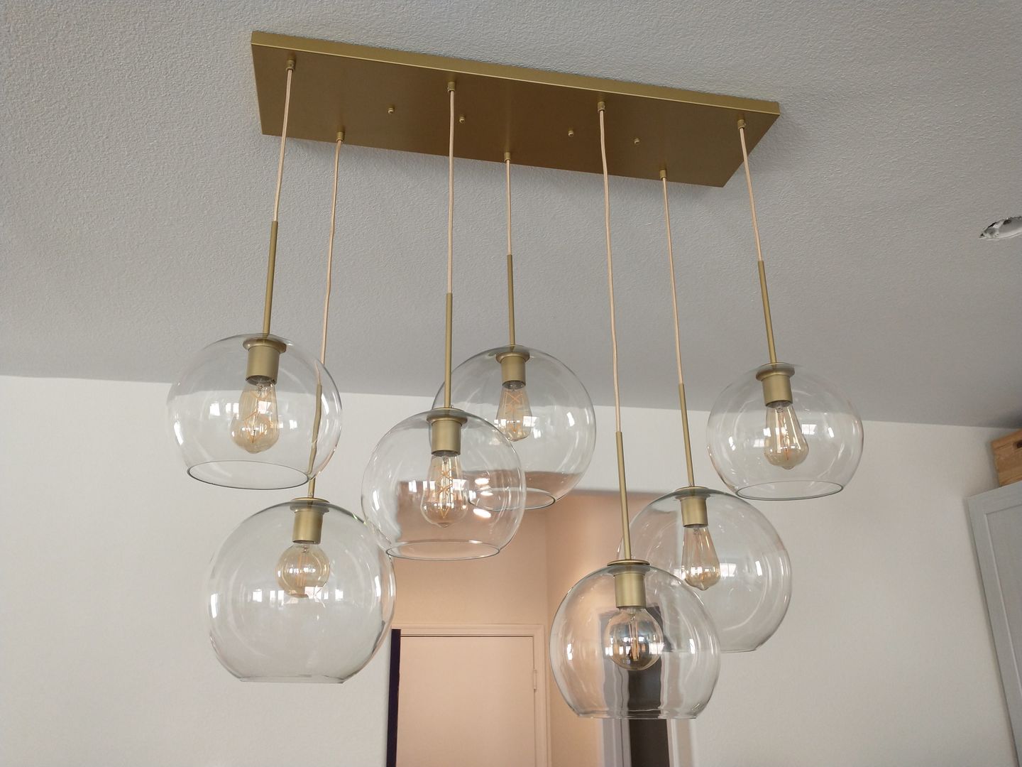 Customer photo review of Modern 7-Light Sculptural Glass Globe Pendant Chandelier