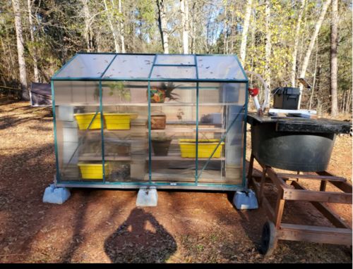 Customer photo review of Erommy 8'x6'x6.6' Aluminum Greenhouse Walk-in Garden Plant Greenhouses