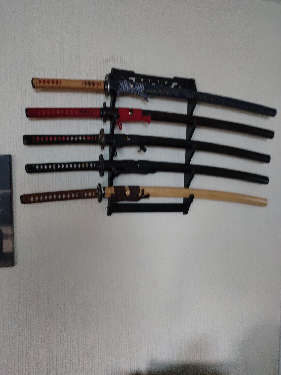 Customer photo review of Handmade Quality Japanese Samurai Sword Katana Clay Tempered Blade