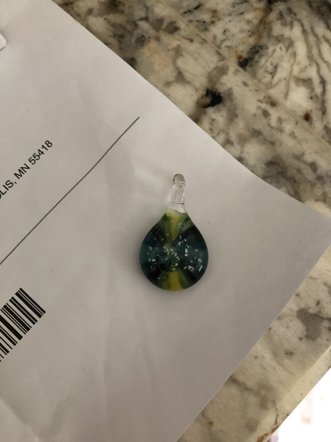 Customer photo review of Ocean Sunset Pendant with Infused Cremation Ashes