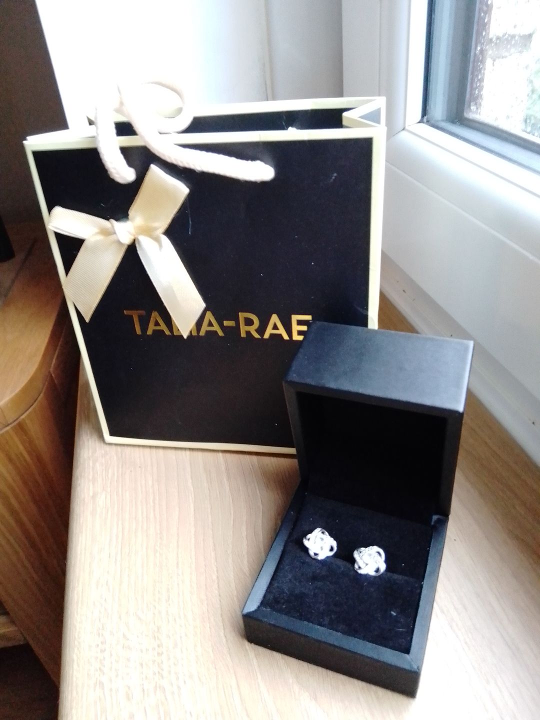 Customer photo review of Silver Love Knot Earrings