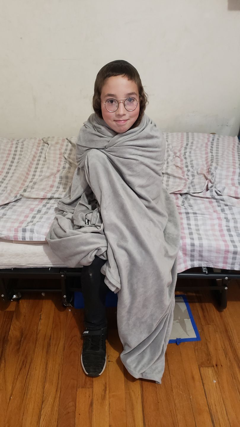 Customer photo review of MegaBee Minky Throw Blanket Solid Light Grey
