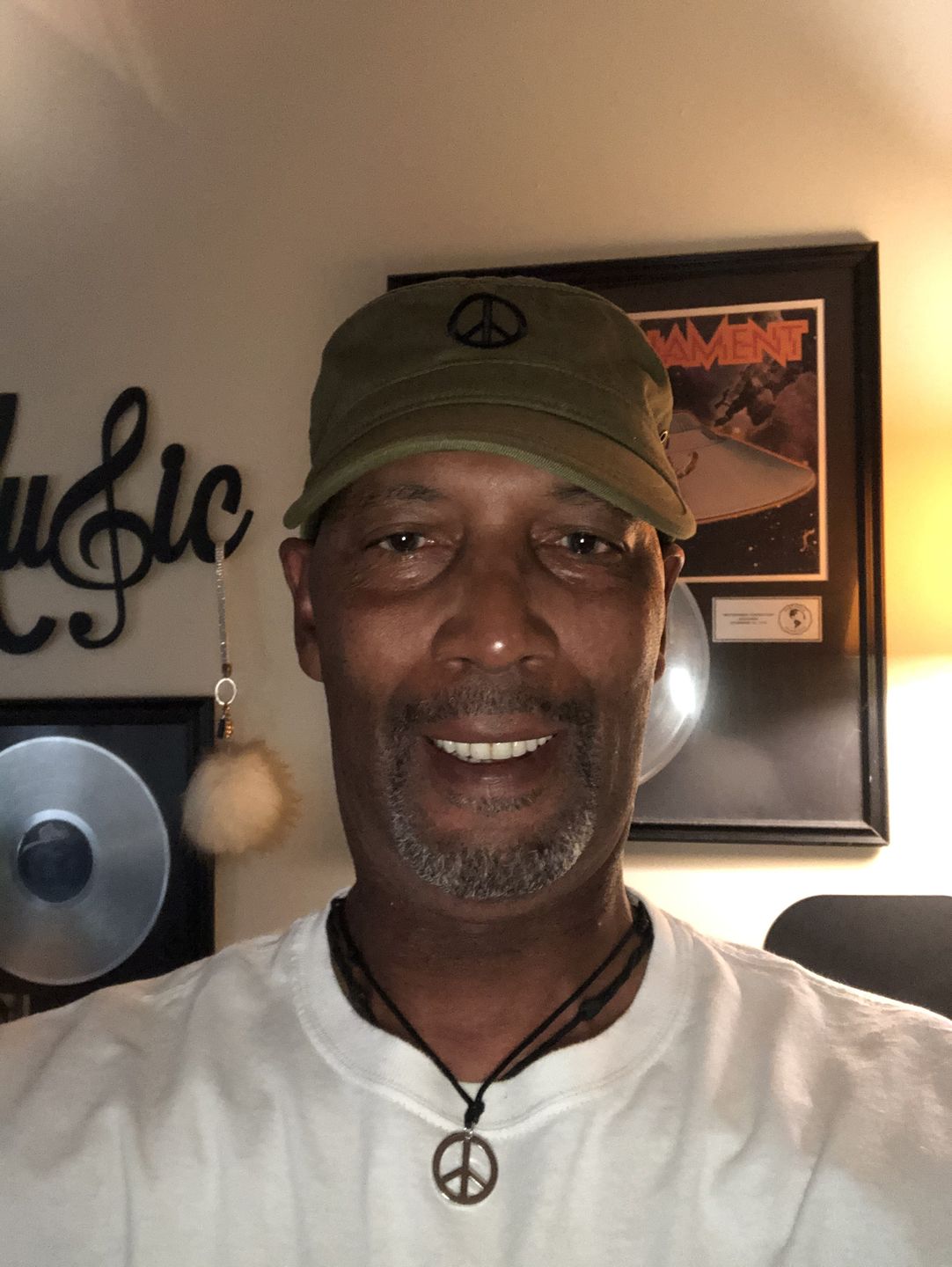 Customer photo review of Chrome Peace Necklace