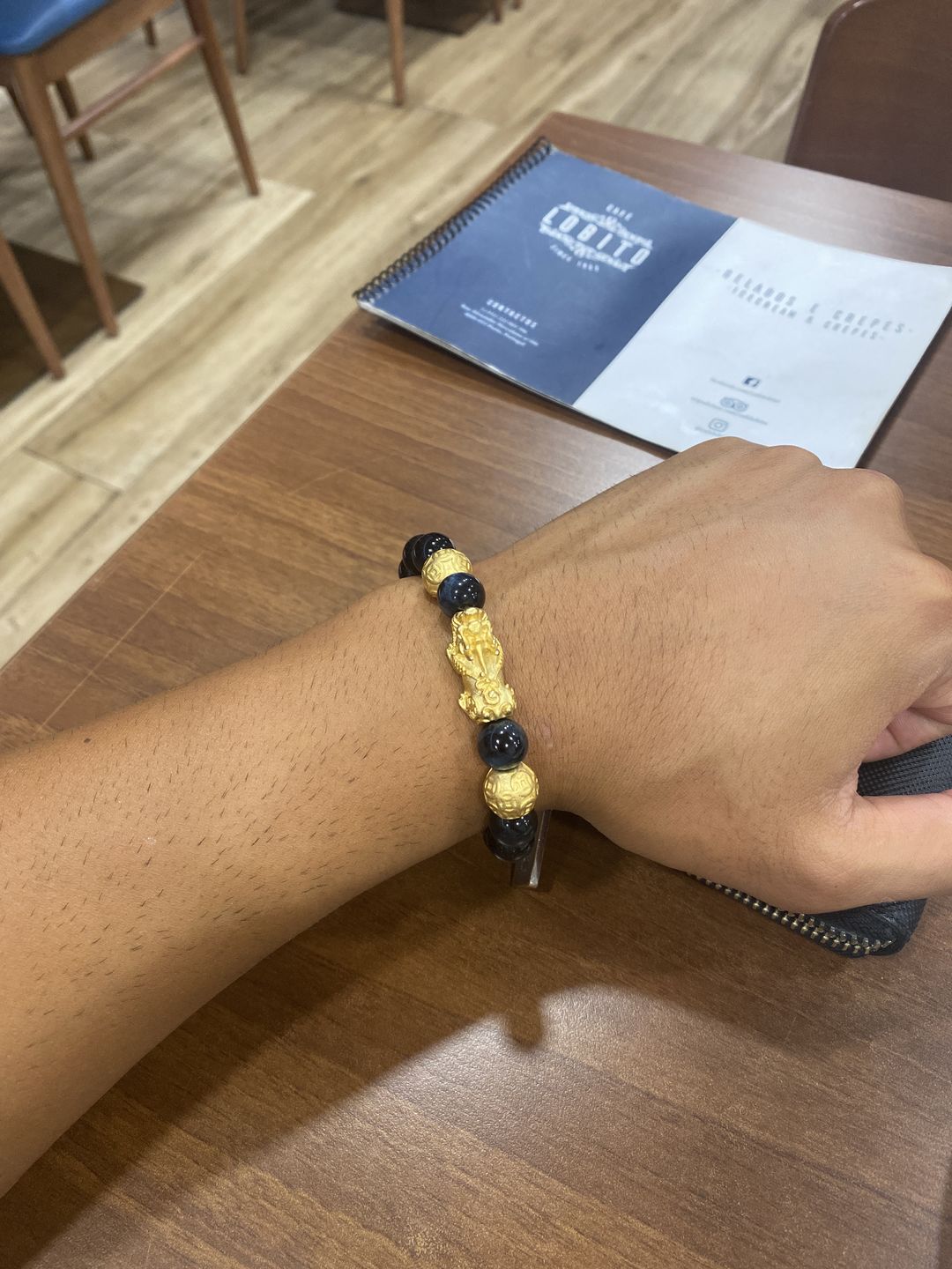 Customer photo review of Blue Tiger Eyes Wealth Mantra Feng Shui Pixiu Bracelet
