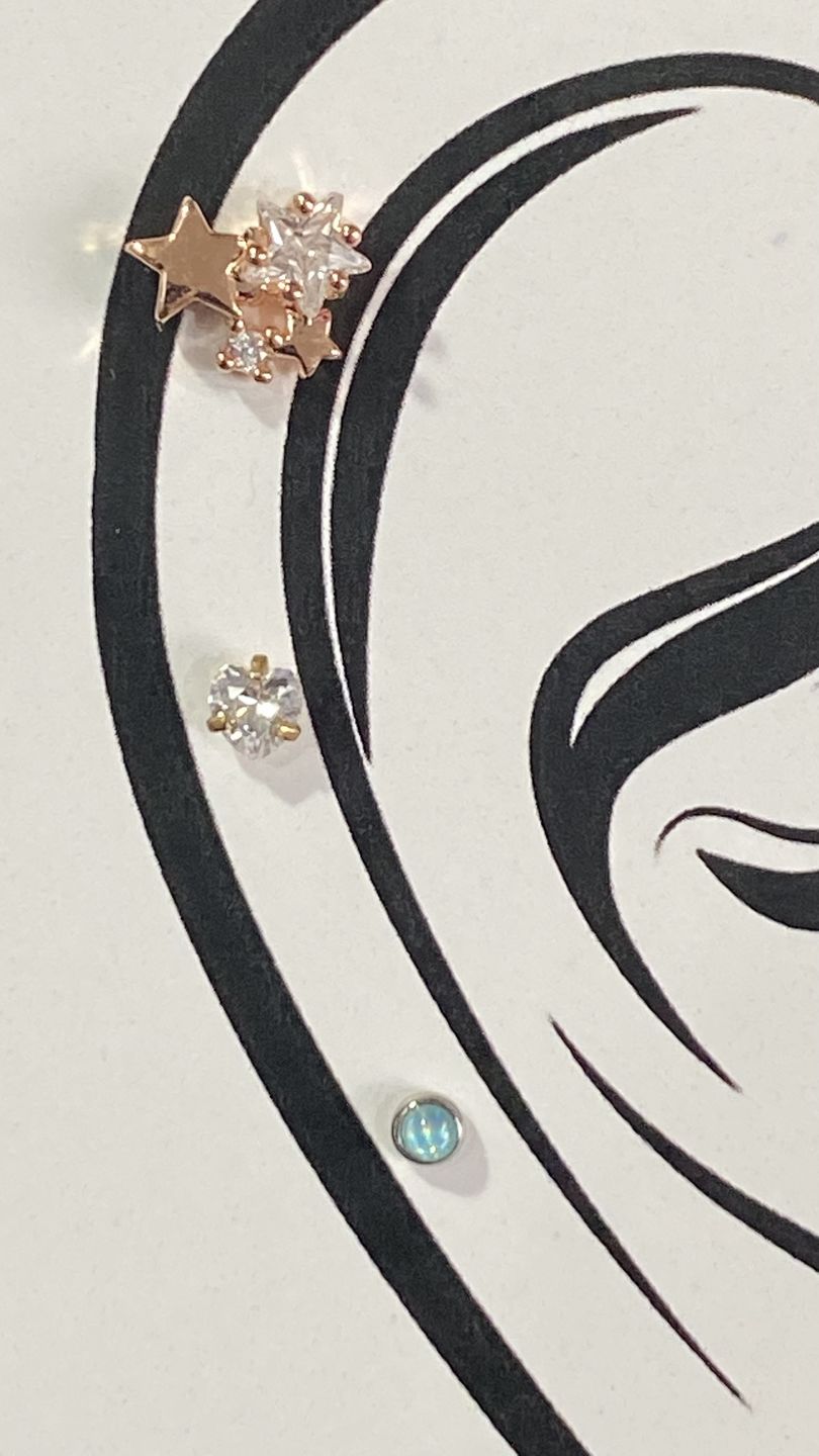 Customer photo review of Piercing Estrellas Rosca Plana