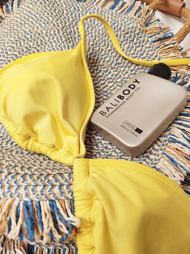 Customer photo review of Shimmering Body Oil
