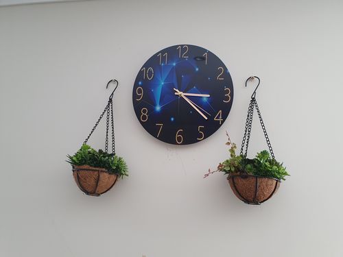 Customer photo review of Modern Visions Geometric Wall Clock