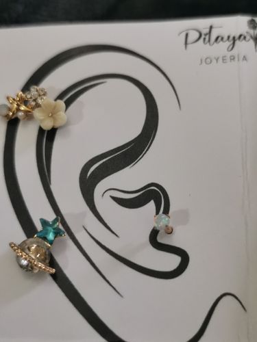 Customer photo review of Piercing Ópalo Blanco Titanio