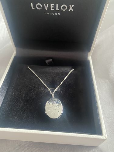 Customer photo review of Little Oval Scroll Locket – Silver