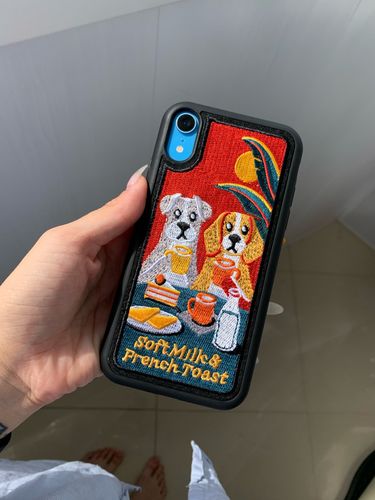 Customer photo review of Embroidered Dog iPhone Case