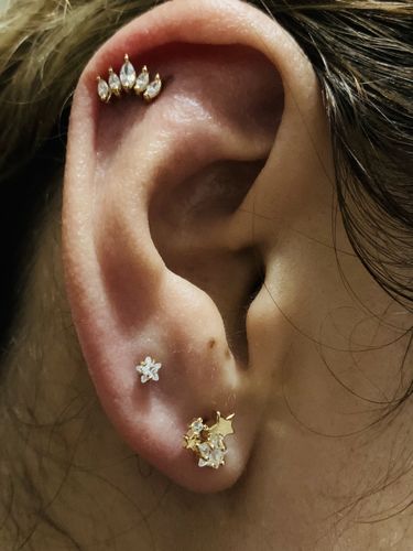 Customer photo review of Piercing de Cinco Puntas