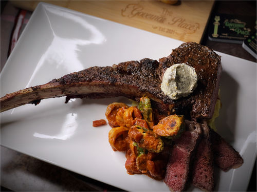 Customer photo review of Mini Bone Tomahawk Steak, Prime