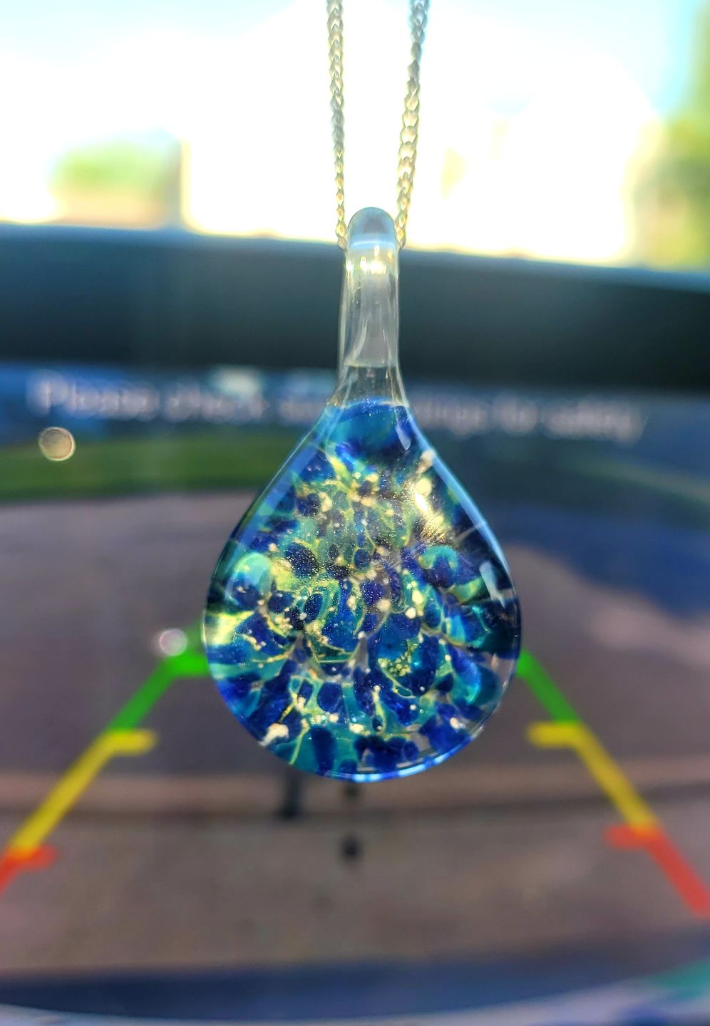 Customer photo review of Blue Moon Cremation Pendant