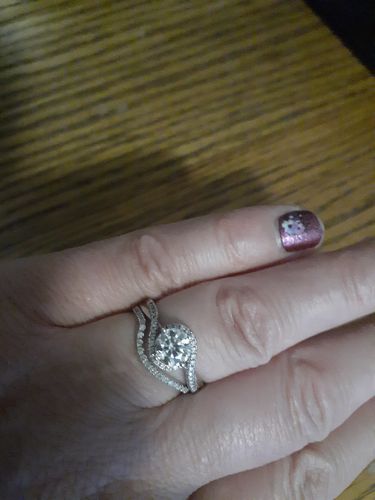 Customer photo review of Round Moissanite Angel Eyes Sterling Silver Wedding Ring