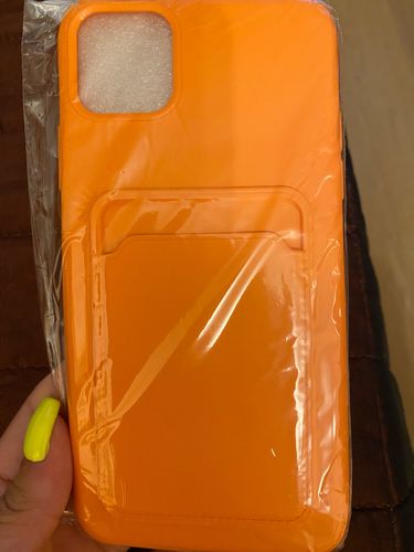 Customer photo review of Simple Color Orange Wallet iPhone Case