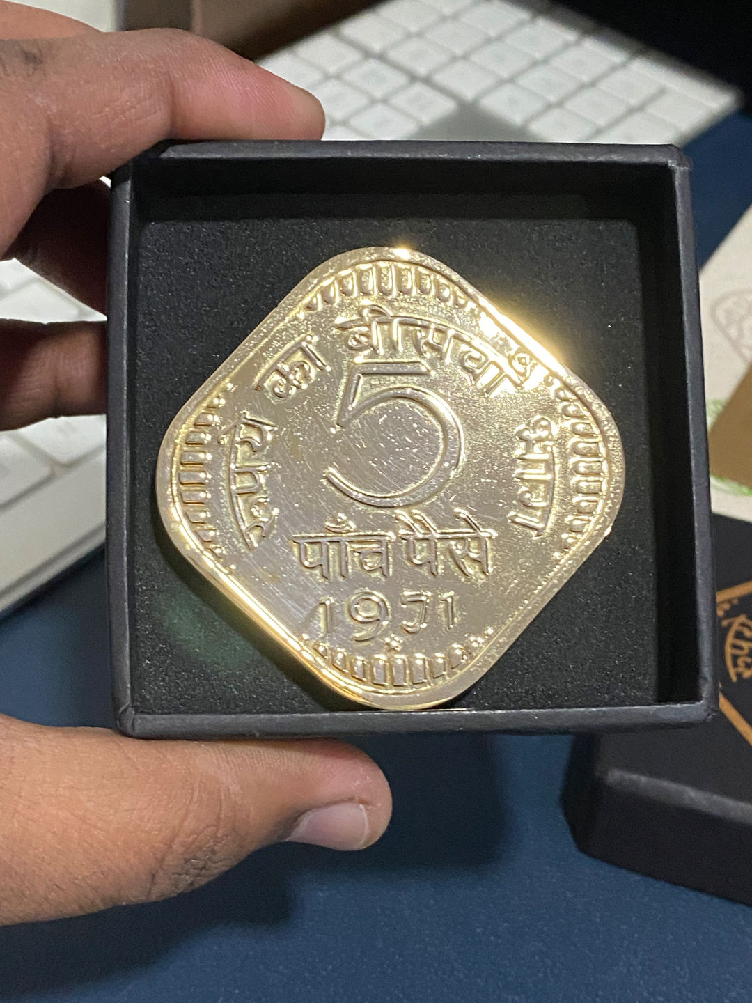 Customer photo review of Paperweight 5 Paise - Brass