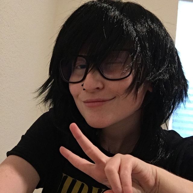Customer photo review of Men Black Long Straight Fringe Bangs Layered Mullet Cosplay Wig