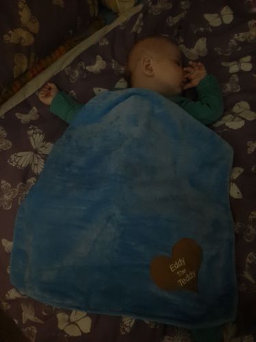 Customer photo review of Eddy The Teddy Snuggle Blanket