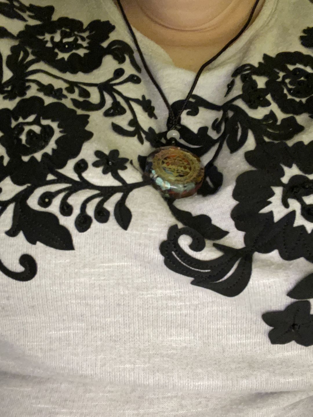 Customer photo review of Sacred Sri Yantra Orgonite Chakra Necklace