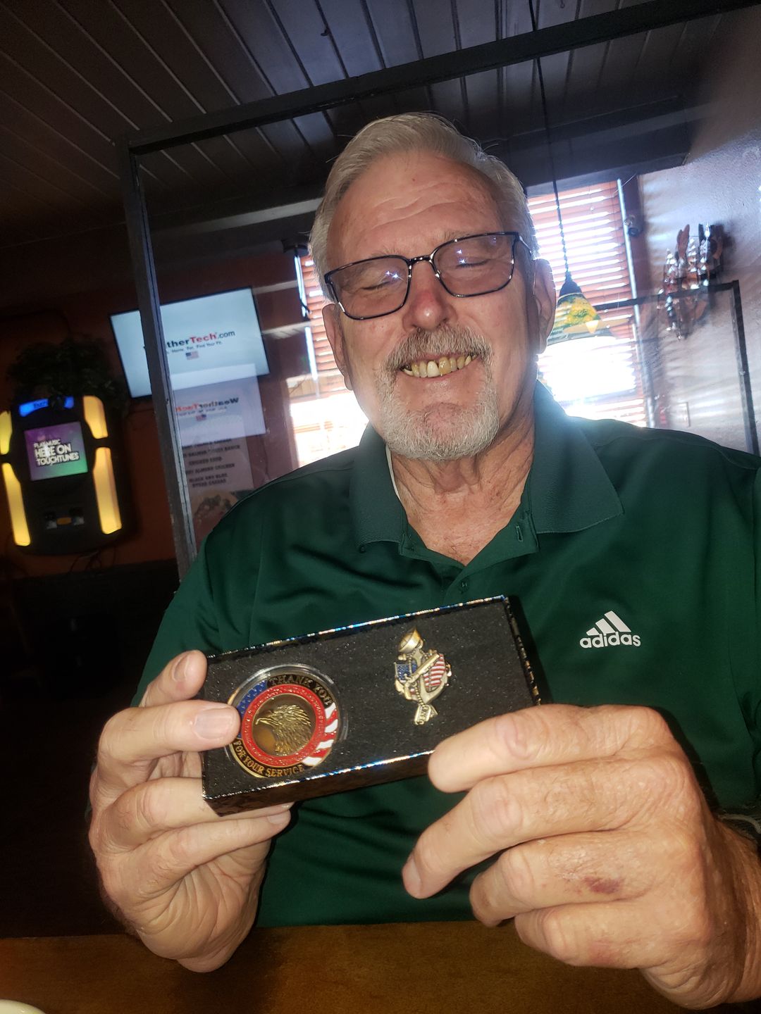 Customer photo review of US Navy Veteran Pin