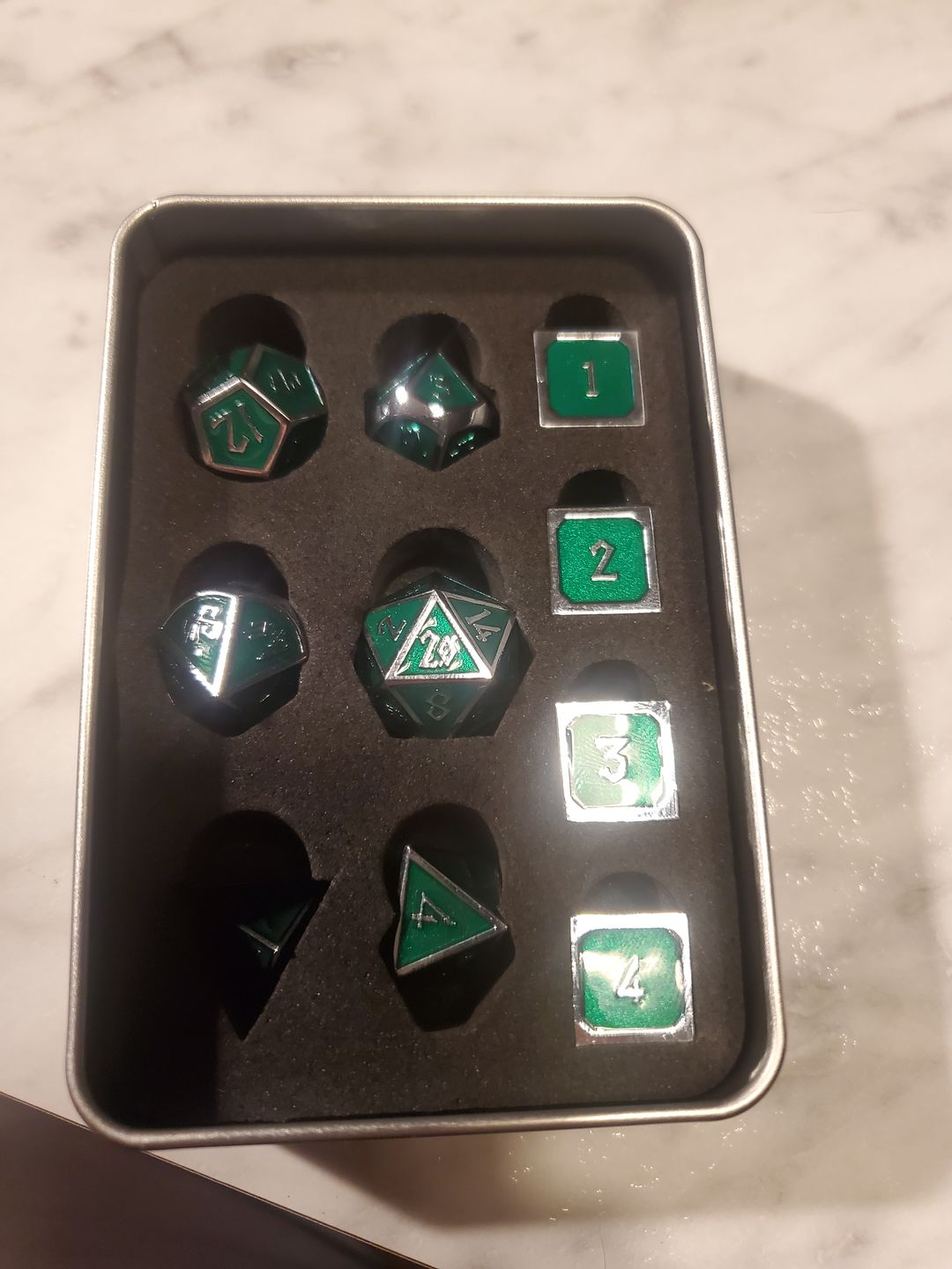 Customer photo review of ELDER RUNES EMERALD AND SILVER METAL SET