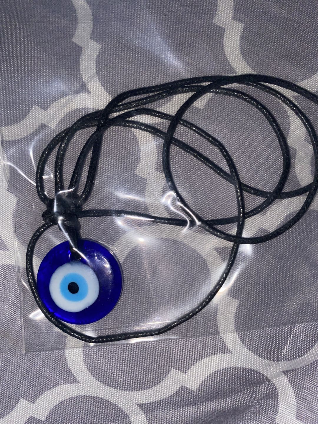 Customer photo review of Glass Evil Eye Good Luck and Protection Necklace
