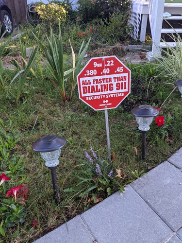 Customer photo review of All Faster Than Security Sign Red