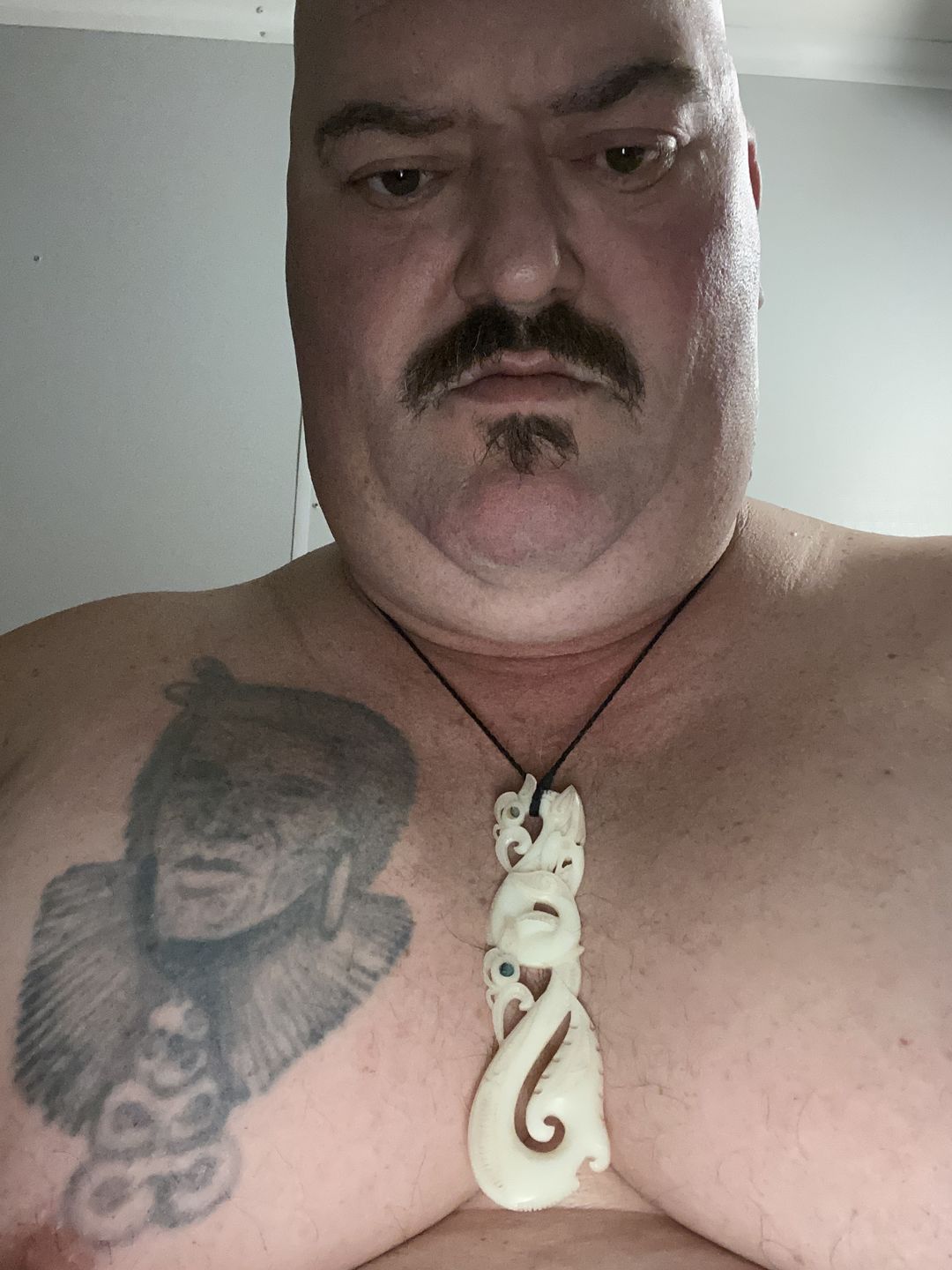Customer photo review of Intricately Carved 12.5cm Maori Bone Manaia Necklace