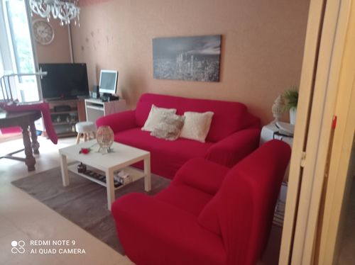 Customer photo review of Rouge - Housses Extensibles de Fauteuil et Canapé - La Maison des Housses