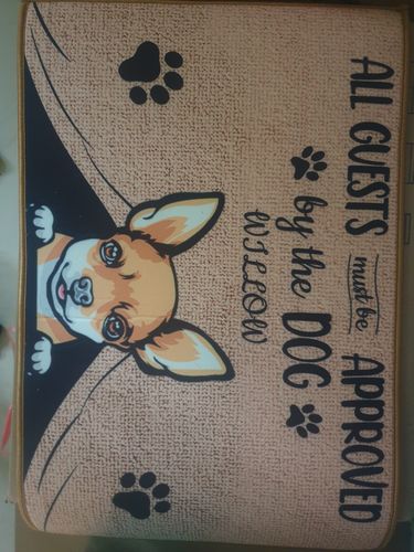 Customer photo review of All Guests Must Be Approved By The Dog Custom Doormat