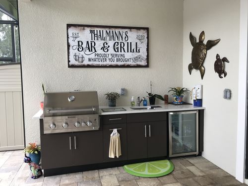 Customer photo review of Personalized Bar and Grill Sign