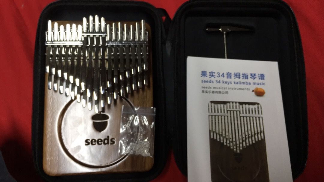 Customer photo review of Seeds 34 Keys 24 Key Chromatic Kalimba Double Layer Treble Thumb Finger Piano