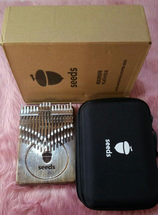 Customer photo review of Seeds 34 Keys 24 Key Chromatic Kalimba Double Layer Treble Thumb Finger Piano