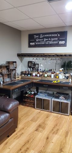 Customer photo review of Bar & Lounge Sign Proudly Serving Whatever You Brought Bar Sign Basement Bar Wall Décor Established Bar Sign Rustic Family Name Bar Sign