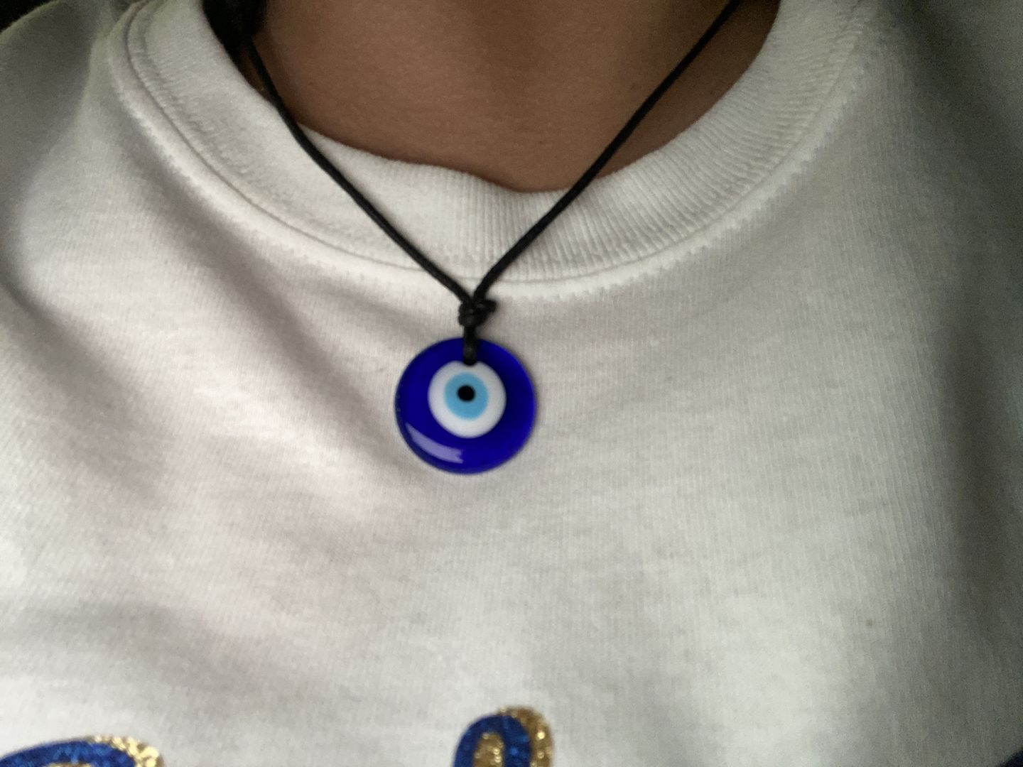 Customer photo review of Glass Evil Eye Good Luck and Protection Necklace