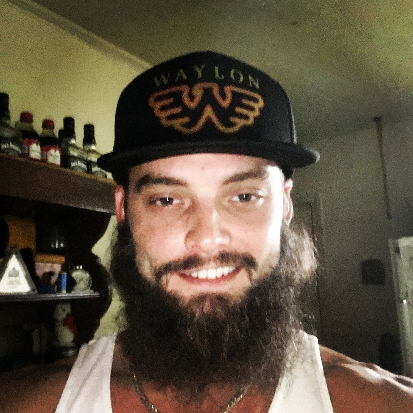 Customer photo review of Waylon Jennings Distressed Flying W Trucker Hat - Black