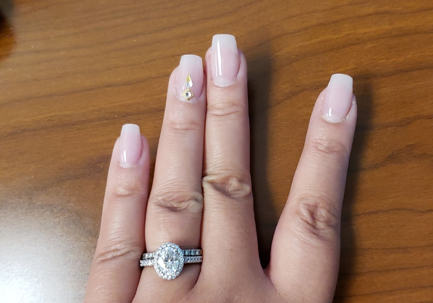Customer photo review of Halo Oval Cut Moissanite Pave Sterling Silver Engagement Ring