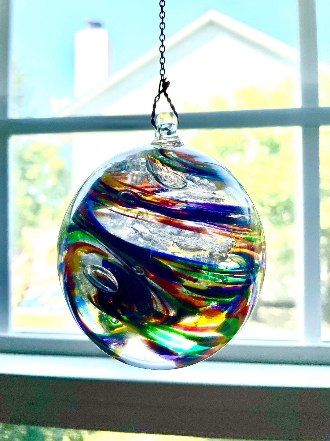 Customer photo review of Rainbow Confetti Orb with Cremation Ashes