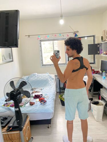 Customer photo review of Adjustable Posture Corrector - Back Posture Brace for Clavicle Support and Pain Relief