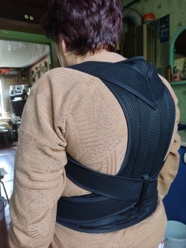 Customer photo review of Back Posture Corrector Posture Brace Support - Adjustable Back Trainer