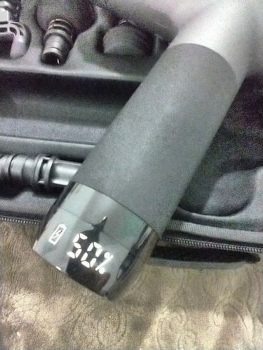 Customer photo review of BOOSTER Premium Recovery Massage Gun With 6 Massage Heads - Smart Hit Technology