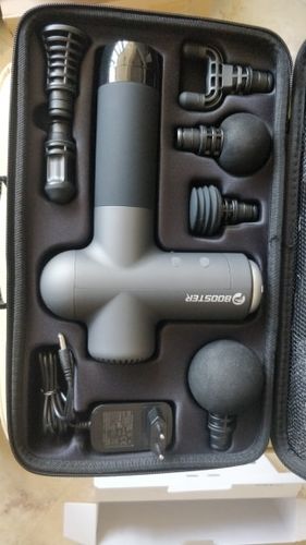 Customer photo review of BOOSTER Premium Recovery Massage Gun With 6 Massage Heads - Smart Hit Technology